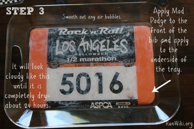 DIY Race Bib Tray for runners. Upcylce old race memories with this easy craft idea. If you are wondering what to do with old bibs, heres an answer. If you can cut and glue you can make this. Great Christmas gift idea for the runner in your life. Half marathon training| 5K training | 10K training for beginners | fitness | motivation | quotes | workout tips