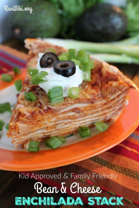 Bean and cheese Enchilada Stack. My family and I love this easy weeknight dinner idea. Nothing too spicy, so even most young kids will love it- serve with rice. I make several ahead of time and freeze for later. So simple to make- only three ingredients that you probably have in your pantry. | Inexpensive Meal Idea| Mexican Food Recipe | Potluck | Gameday